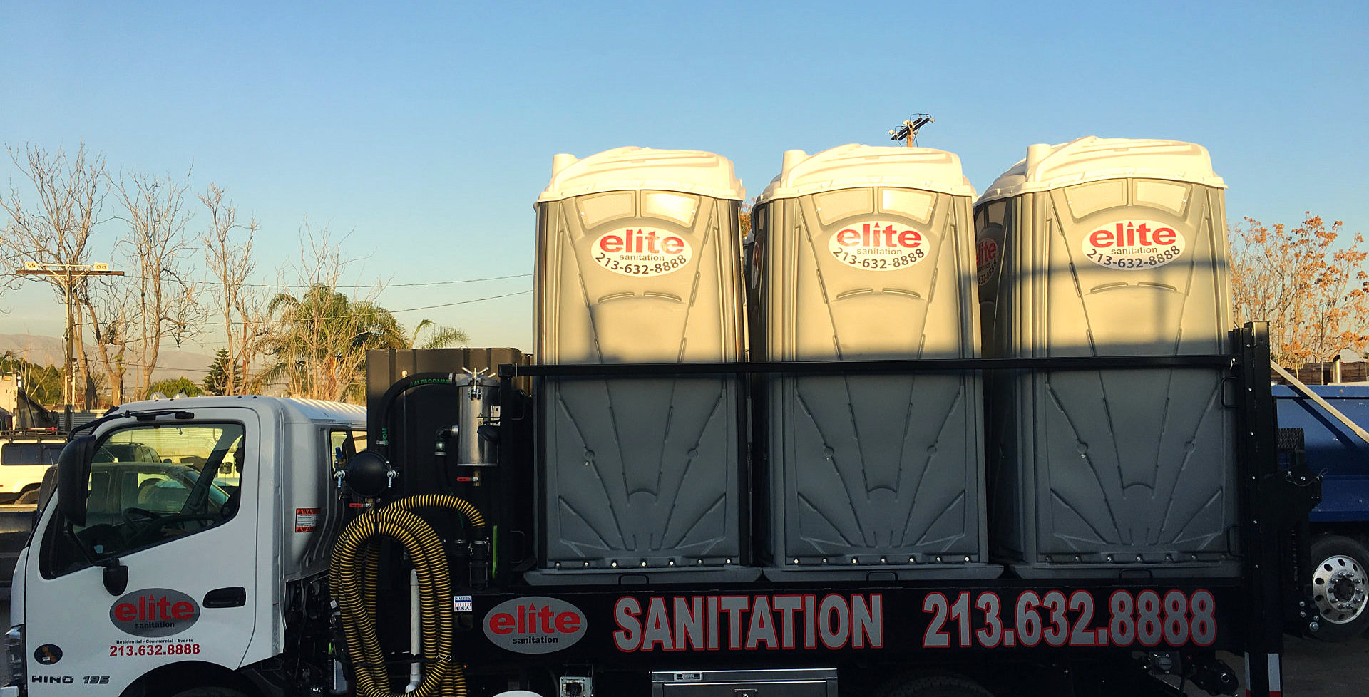 truck with load of portable toilets